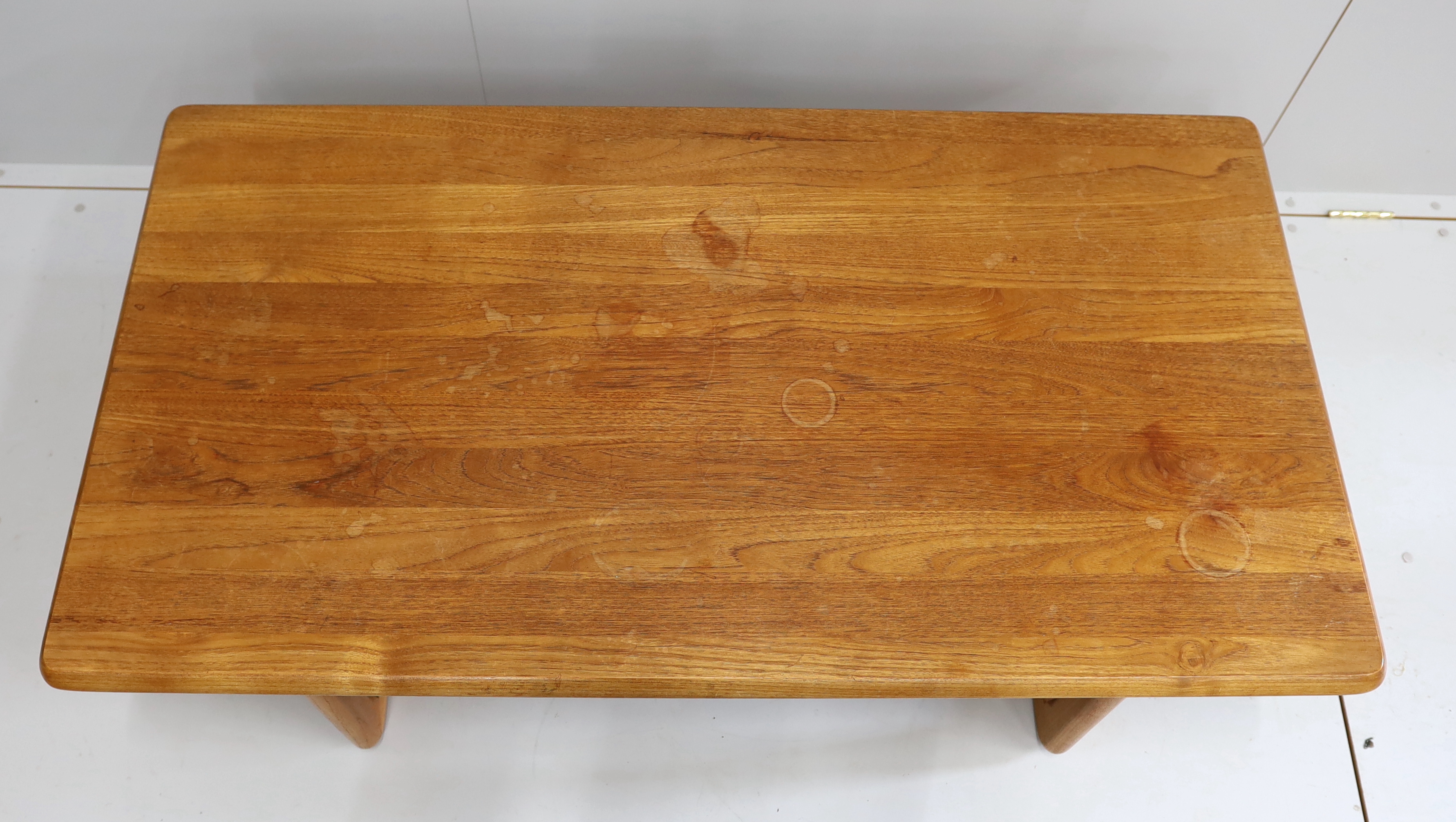 Attributed to Niels Bach, a rectangular mid century teak coffee table, width 138cm, depth 74cm, height 45cm